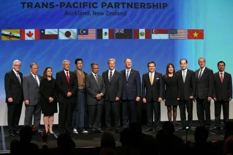 TPP各成员国代表合影（图片来源：法国新闻社/越通社）