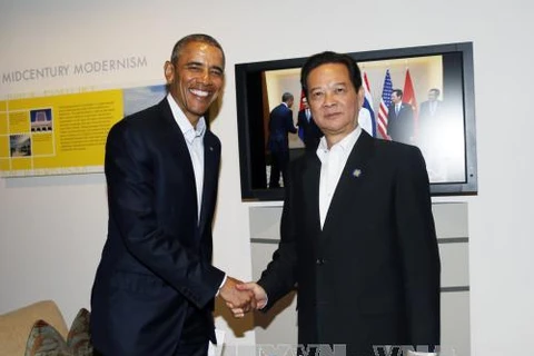 越南政府总理阮晋勇会见美国总统奥巴马（图片来源：越通社）
