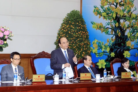 越南政府副总理阮春福 在会上发表讲话（图片来源：越通社）