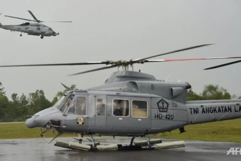 附图：印度尼西亚军用直升机（图片来源：法国新闻社）