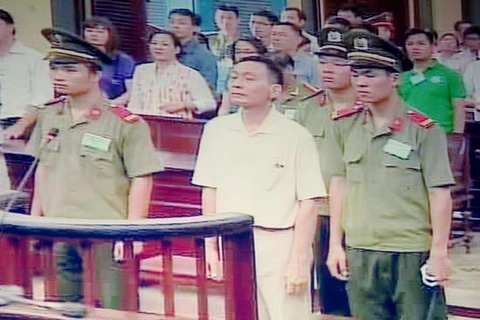 在法庭上的被告人阮廷玉（图片来源：sggp.org.vn）