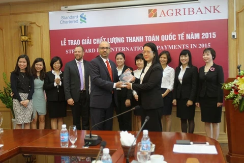 越南农业与农存发展银行荣获2015年度国际清算质量奖颁奖仪式（图片来源：越通社）