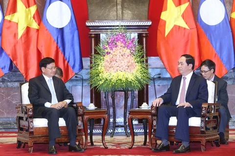 越南国家主席陈大光会见老挝总理通伦·西苏里（图片来源：越通社）