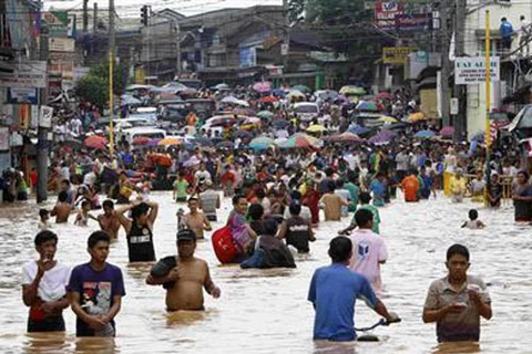 菲律宾多地遭遇强降雨并引发洪水​（图片来源： Reuters）