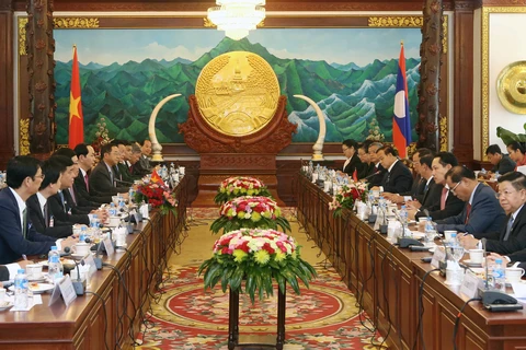 越南国家主席陈大光与老挝人民革党总书记、国家主席本扬•沃拉吉举行会谈（图片来源：越通社）