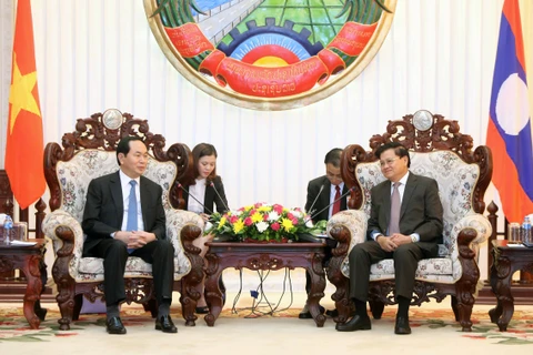 越南国家主席陈大光会见老挝总理通论·西苏里。（图片来源：越通社）