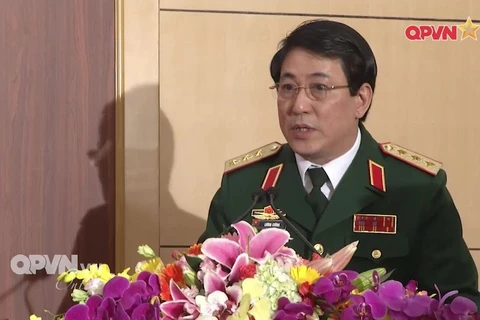 越南人民军总政治局主任梁强上。