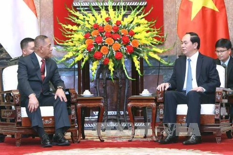 越南国家主席陈大光会见印尼国防部长里亚米扎尔德·里亚库杜（图片来源：越通社）