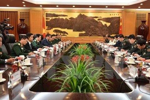 越中两国国防部代表团进行会谈（图片来源：越通社）
