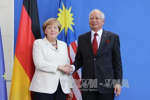 马来西亚总理纳吉布与德国政府总理安格拉·默克尔（图片来源：越通社）