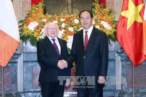 越南国家主席陈大光和爱尔兰共和国总统麦克·希金斯（图片来源：越通社）