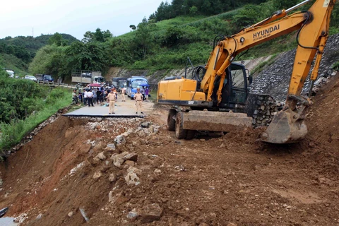 越南北部山区遭暴雨洪水袭击 道路冲断 农户损失惨重（组图）