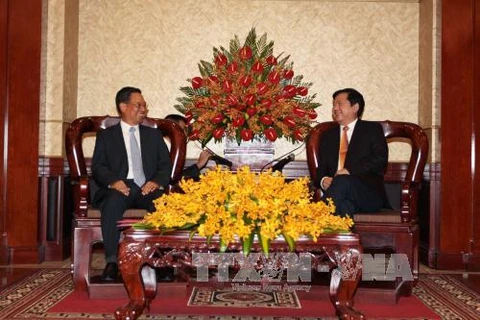 胡志明市委书记丁罗升在胡志明市会见了老挝阿速坡省委书记南·维亚吉