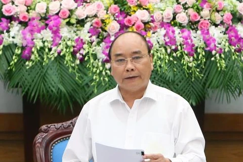 越南政府总理阮春福就经济社会发展情况同全国各地方召开了视频会议