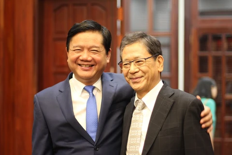 胡志明市市委书记丁罗升与日本驻越南大使大岛浩