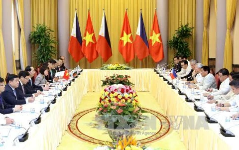 越菲两国领导人举行会谈
