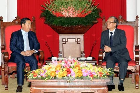 越共会见了柬埔寨人民党中央委员、国会议员及中央外委会副主席索斯亚拉(图片来源：越通社）