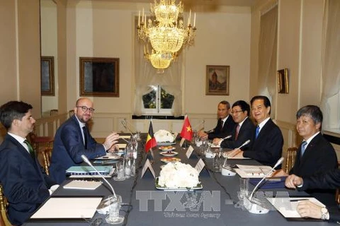 越南政府总理阮晋勇与比利时首相沙赫勒·米歇尔举行会谈。（图片来源：越通社）
