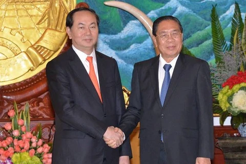 老挝人民革命党中央总书记、国家主席朱马里·赛雅颂会见越南公安部长陈大光大将