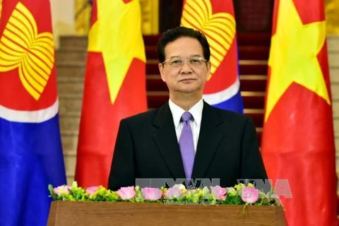 越南政府总理阮晋勇就东盟共同体的建成发表了电视讲话。（图片来源：越通社）