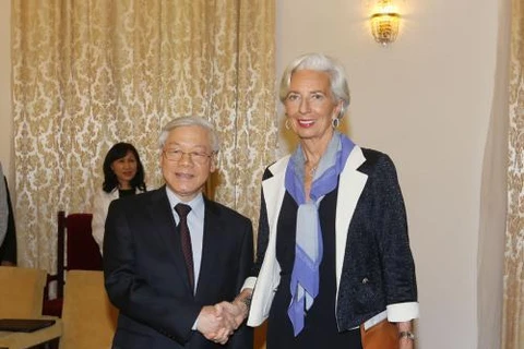 越共中央总书记阮富仲会见国际货币基金组织总裁拉加德。（图片来源：越通社）