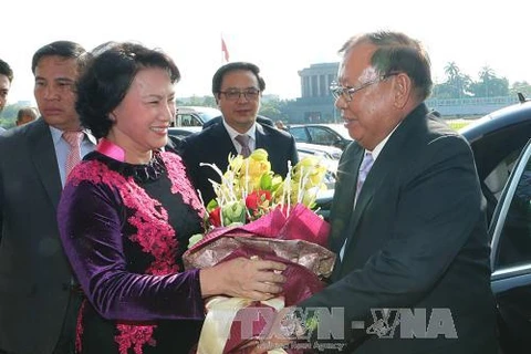 阮氏金银主席会见老挝人民革命党中央委员会总书记、国家主席本扬·沃拉吉。
