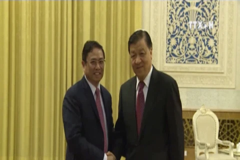 中国共产党领导会见 越共中央组织部部长范明政