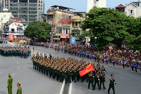 参展作品之一：越南人民军队战士参加游行活动庆祝九•二国庆节70周年。