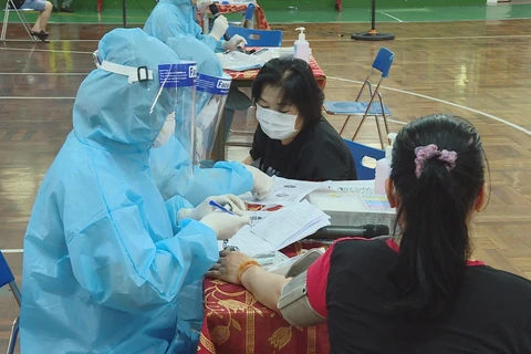 越南新冠疫苗接种速度快于区域内多国