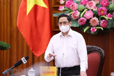 越南政府总理范明政：研究建立新冠疫苗基金