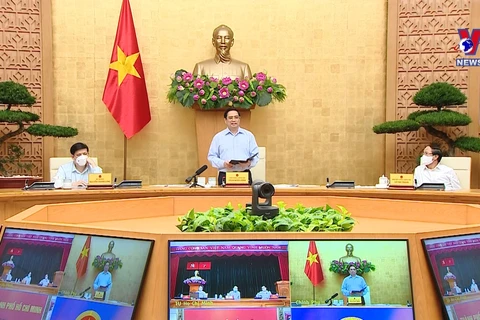 范明政就疫情防控工作与胡志明市领导举行视频会议