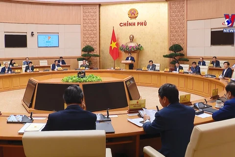 越南政府总理范明政主持召开2月政府例行会议