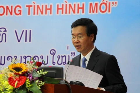 越南共产党与老挝人民革命党第七次理论研讨会开幕