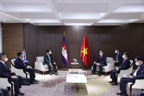 越南政府总理范明政分别会见埔寨首相、新加坡总理和马来西亚总理