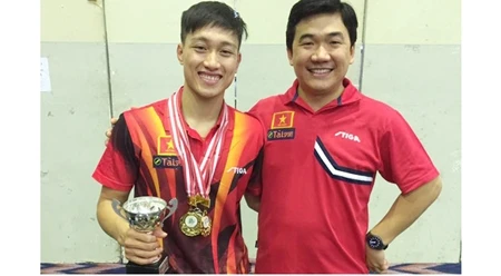 越南乒乓球选手阮英秀和他的教练员阮南海