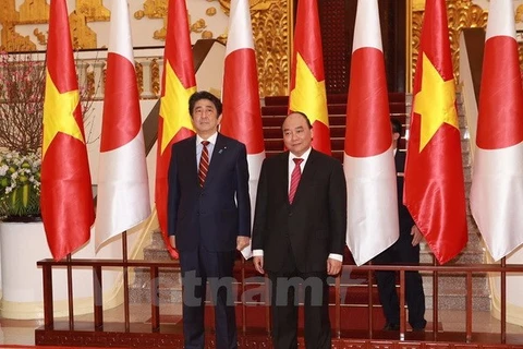 越南政府总理阮春福与日本首相安倍晋三。