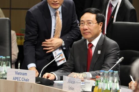 越南政府副总理兼外长范平明出席二十国集团非正式外长会议（图片来源：《越通社》）