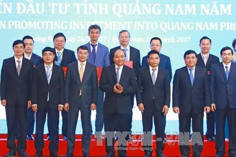 越南政府总理阮春福出席广南省投资促进会。（图片来源：越通社）