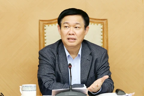 越南政府副总理王廷惠主持召开有关国有企业股份制改革工作的会议​。