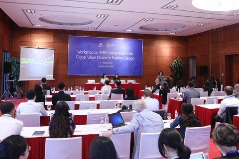 APEC贸易投资委员会关于中小型企业融入服务和服装设计产业的全球价值链研讨会。（图片来源：越通社）