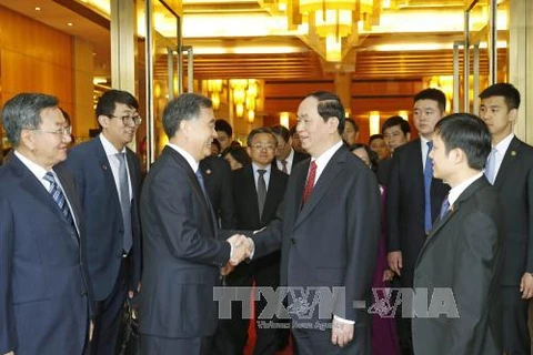 越南国家主席陈大光（右）和中国国务院副总理汪洋（左）。