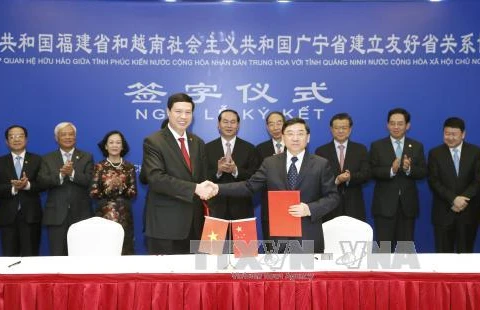 越南国家主席陈大光见证越南广宁省和中国福建省建立友好合作关系的协议书的签署