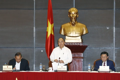 政府总理阮春福在会上发表讲话。（图片来源：越通社）
