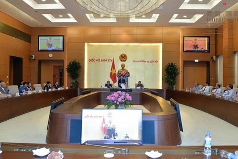 越南国会主席阮氏金银会见安沛省历届省领导人（图片来源：http://quochoi.vn）