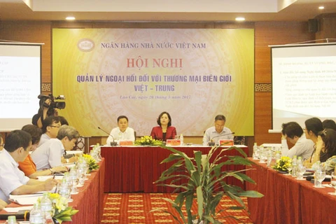 越中边境贸易外汇管理会议全景。（图片来源：baolaocai.vn）