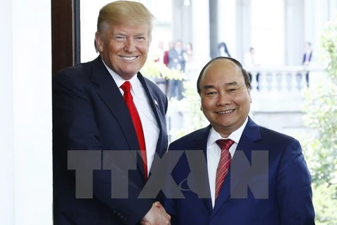 美国总统唐纳德·特朗普和越南政府总理阮春福。（图片来源：越通社）