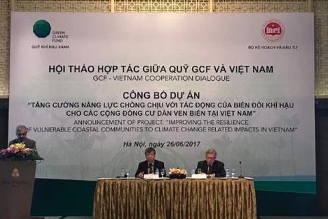 越南计划与投资部同联合国开发计划署（UNDP）和绿色气候基金（GCF）在河内联合举办研讨会。（图片来源：越通社）