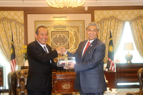 张和平副总理与马来西亚副总理扎希德。