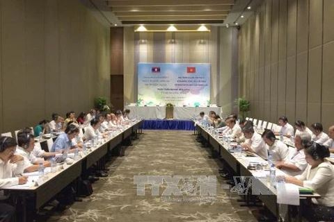 越南共产党和老挝人民革命党第五次理论研讨会全景。