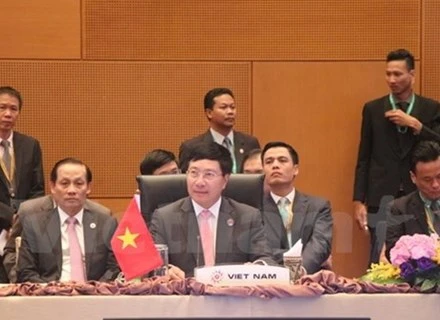 越南政府副总理兼外交部长范平明出席第50届东盟外长会议。